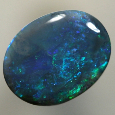 SOLID BLACK OPAL Strong forest greens sparkle over deep ocean blue
